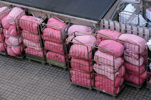 Carts of hotel bedding in Copenhagen, Denmark.