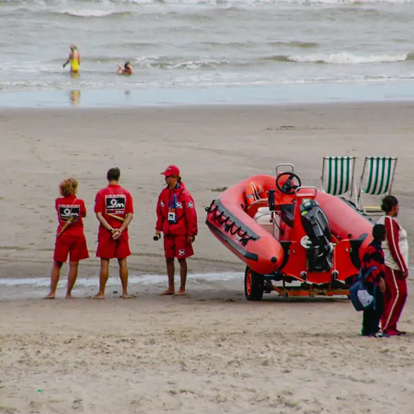Lifeguards keep an eye on beachgoers in Zeebrugge, Belgium.