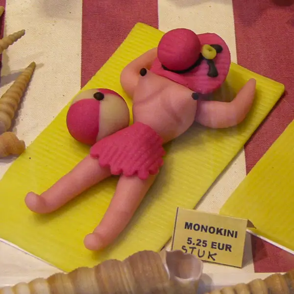 A monokini in marzipan decorates a confectioner's display window in Zeebrugge, Belgium.