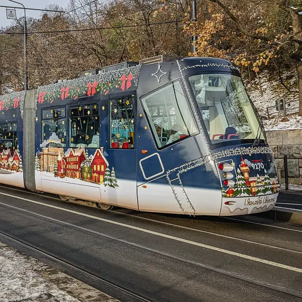 A Prague tram wears Christmas livery for the holiday season.