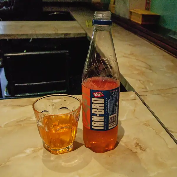 When you're in Scotland, try an irn-Bru (a soft drink that claims to be 'made from girders.'
