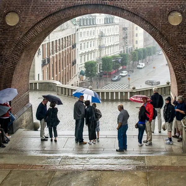 Locals and tourists take shelter from the rain in Helsingborg, Sweden.
