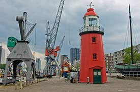 Rotterdam maritime cranes and lighthouse