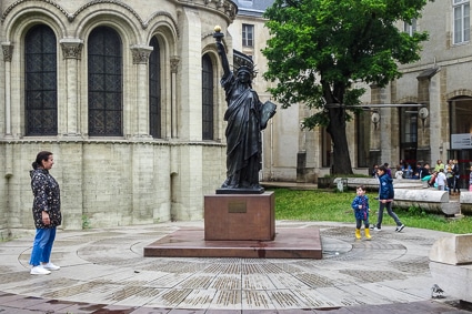 Musee des Arts et Metiers entrance courtyard with Statue of Liberty replica