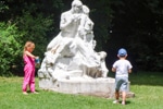 Statue and children in Parc Montsouris