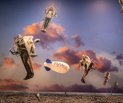 Mural at FlyView "Fly Over Paris" with jetpacks and blimp