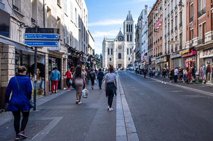 Shopping district with Basilica in downtown Saint-Denis, France
