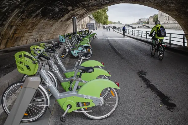 Velib Metropole bicycles along the Seine in Paris.