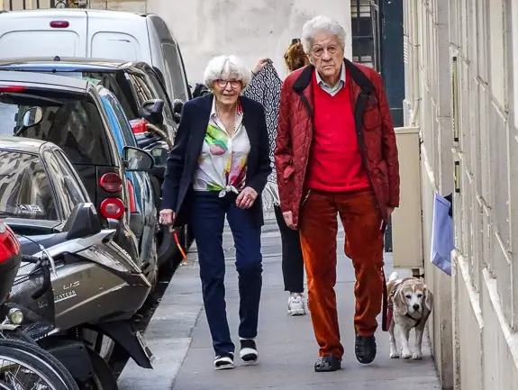 Couple and dog in Montmartre, Paris.