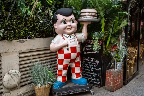 Statuette at David's Diner in Paris, France.