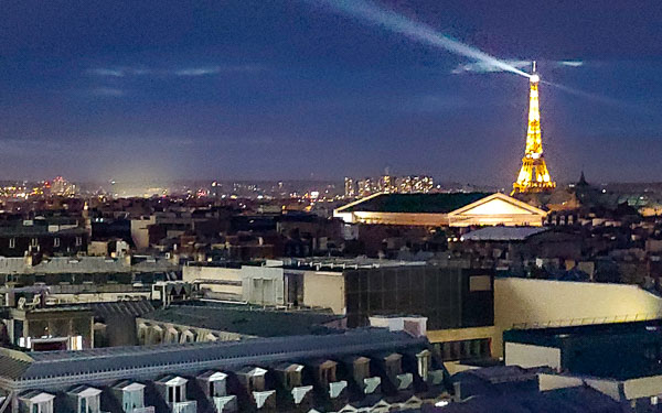 Eiffel Tower light show from Galeries Lafayette roof terrace.