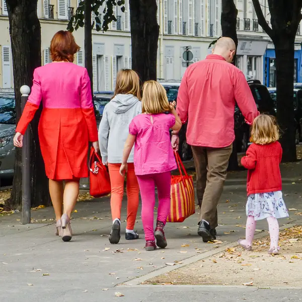 Color-coordinated tourists explore the Left Bank.