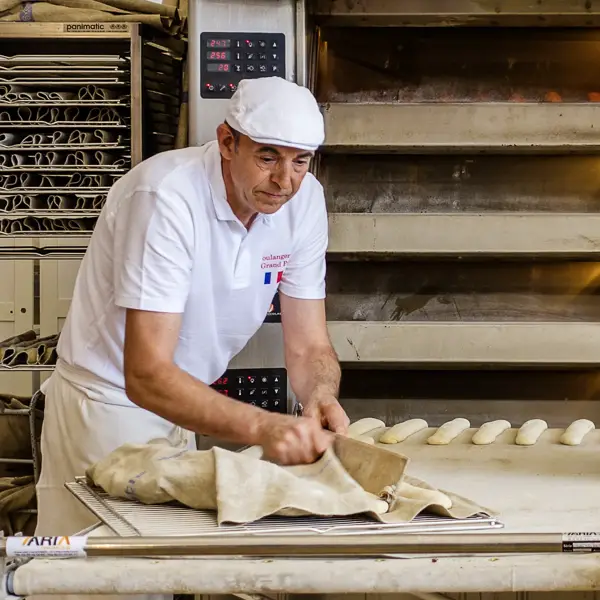 A baker prepares baguettes at the annual F�te du Pain in Paris.