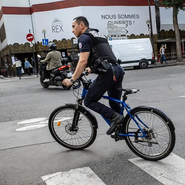 Police officer on a bicycle in Paris.
