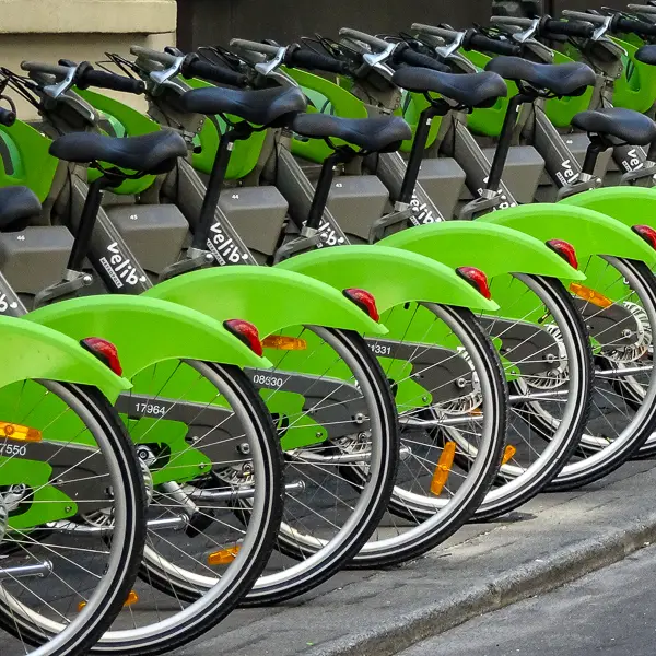 Vélib Metropole bicycles await riders in the 6th arrondissement of Paris.