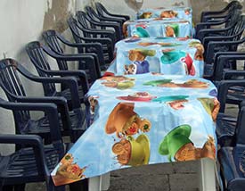 Cafe tables with tablecloths