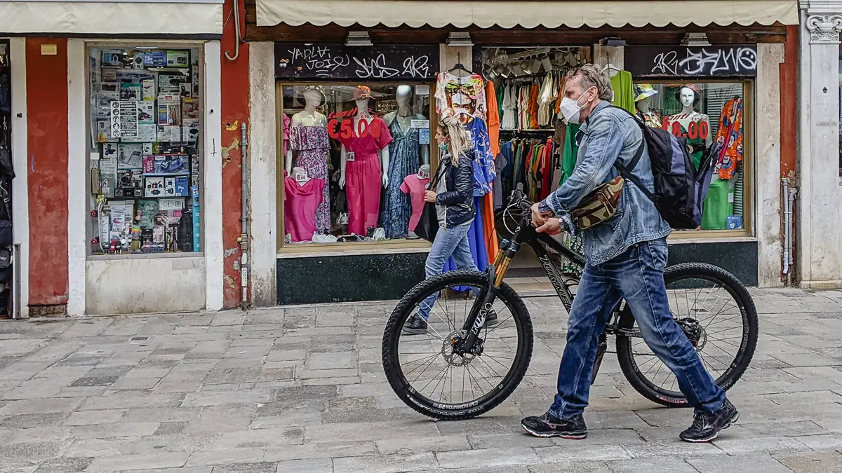 Illegal bicyclists in Venice, Italy.