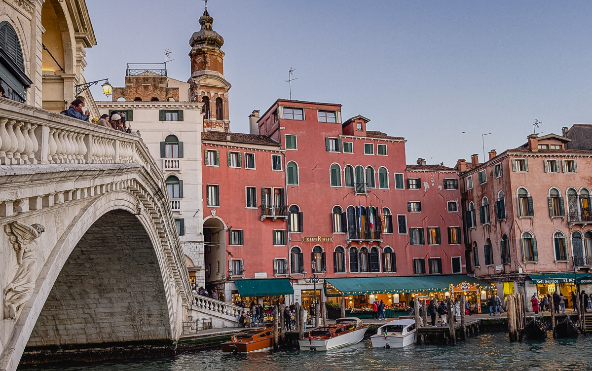 Hotel Rialto and Rialto Bridge on the Grand Canal in Venice, Italy.