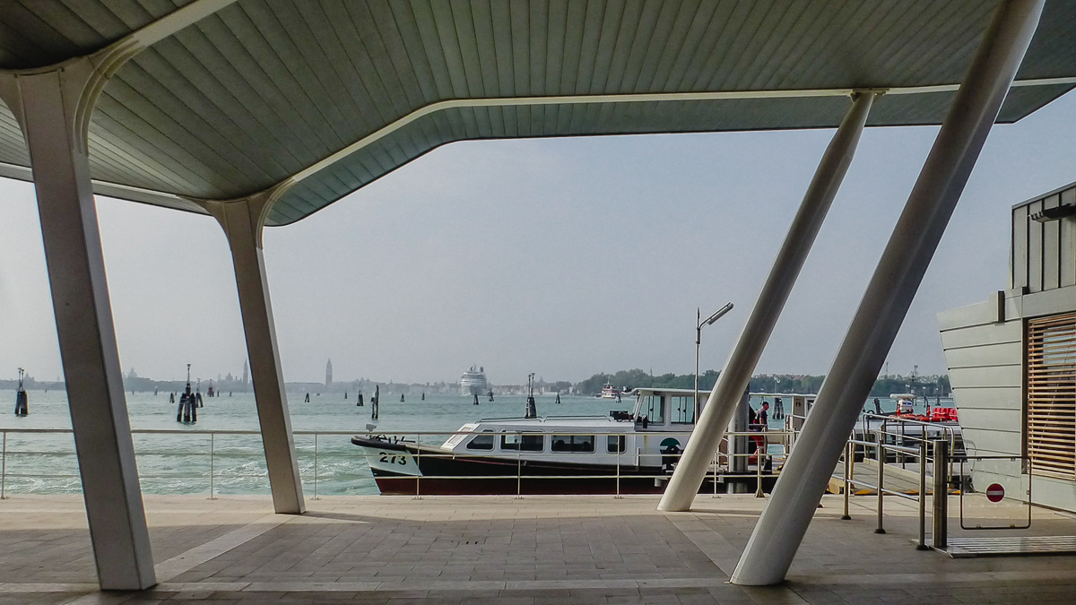 Lido SME vaporetto station with motoscafo in Venice, Italy.