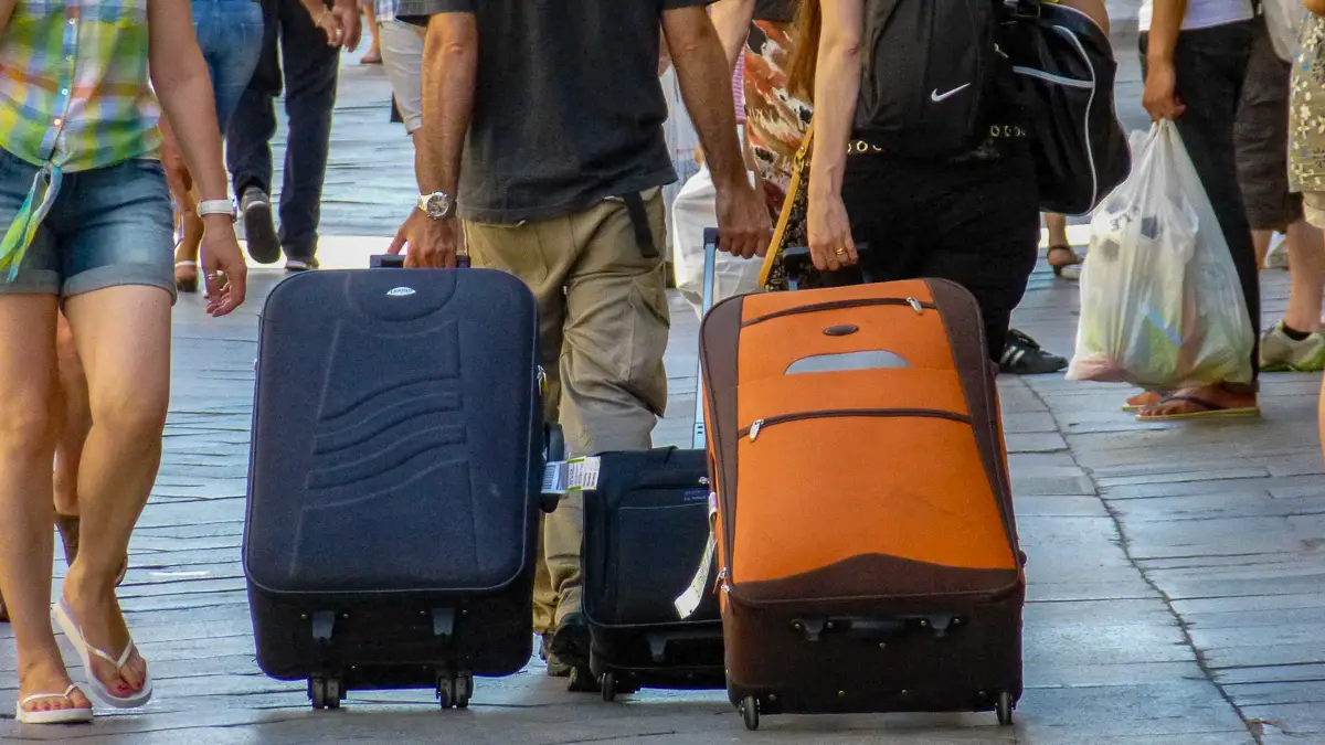Venice tourists with luggage