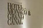 Hotel Monaco & Grand Canal sign near entrance