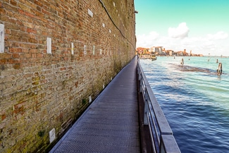 Cantilevered walkway on Arsenale shipyard walls