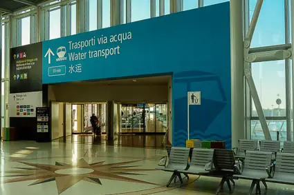 Venice Marco Polo Airport - entrance to moving walkway to Alilaguna airport boats and water taxis