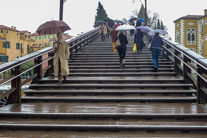 Accademia Bridge with wet steps on a rainy day
