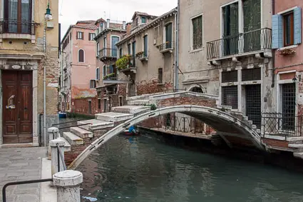 Private bridge without railings in Cannaregio, Venice, Italy