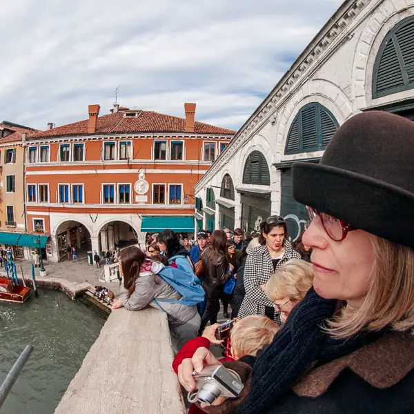 Cheryl Imboden (foreground) joins a crowd of sightseeers on Venice's Rialto Bridge.
