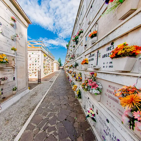 After a dozen years, remains are transferred from open-air graves to metal boxes that are interred in outdoor mausoleums.