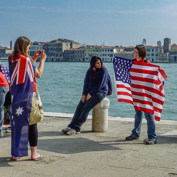  This photo was taken at a more innocent time, when students from the U.S. could show their flag with pride.