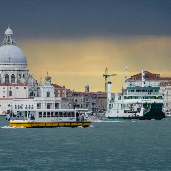 Barbara Cavalieri, a student tour guide, shows off a view from Ca' Foscari University's 15th Century headquarters on the Grand Canal in Venice, Italy. Free tours of the palazzo and its neighboring buildings are a delight.