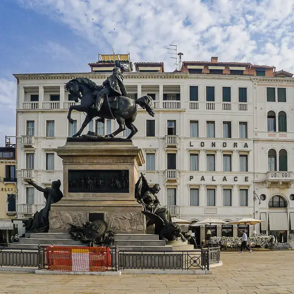 The Hotel Londra Palace faces an equestrian statue and St. Mark's Basin.