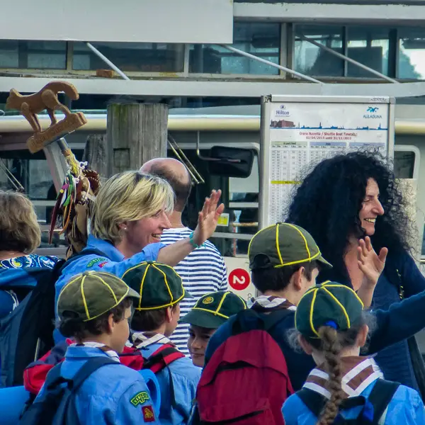 Cub Scouts prepare to board a public water bus.