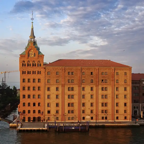 The Hilton Molino Stucky occupies a former flour mill on the island of Giudecca. Public water buses and a hotel launch connect it with Venice's historic center.