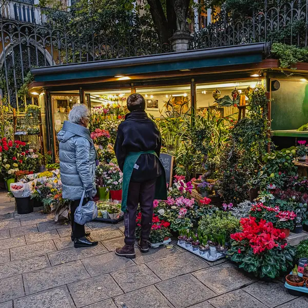 This florist's shop near Venice's Accademia Bridge does al lively business year-round.