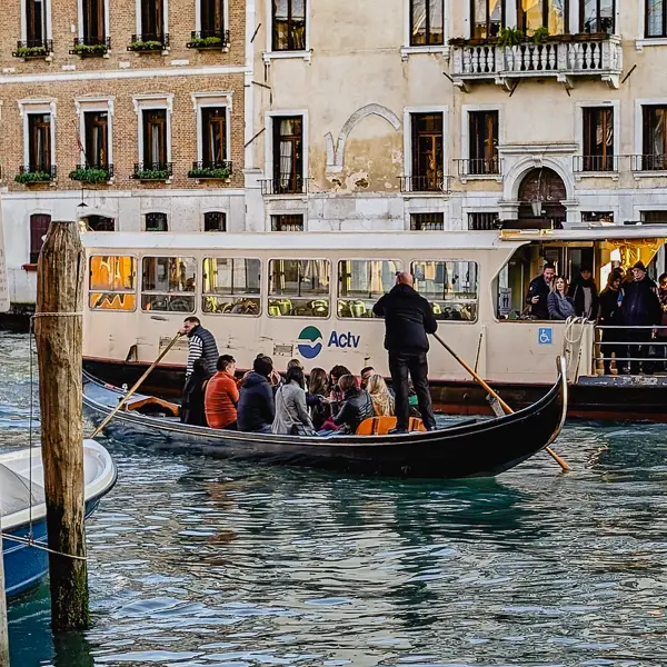 Traghetti, like sightseeing gondole, provide an immersive experience amid the public water buses, water taxis, cargo boats, and boat traffic on the Grand Canal.