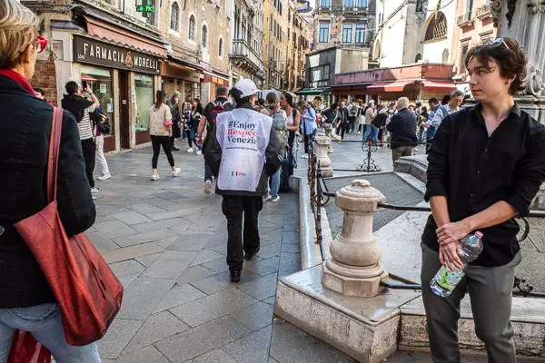Tourists and Venetians in Venice's Campo San Bartolomeo.