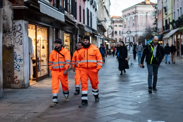 Workmen in Venice, Italy.