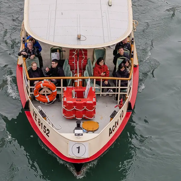 A No. 1 vaporetto cruises up the Grand Canal in Venice, Italy.