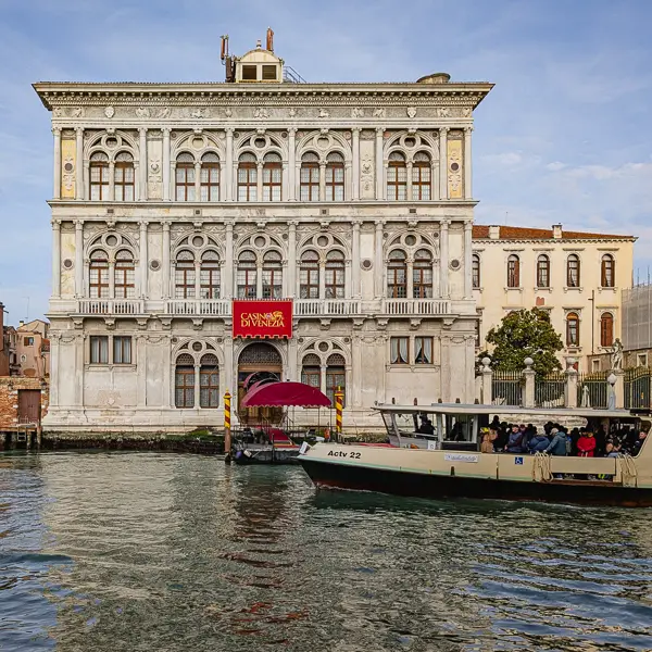A vaporetto passes the Casino di Venezia on Venice's Grand Canal.