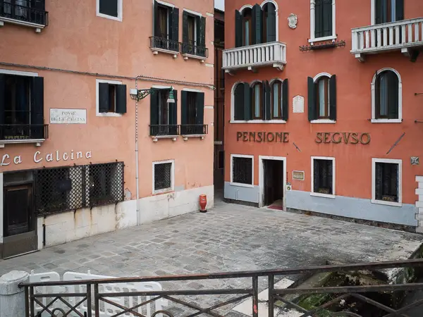 Two hotels, the Calcina and the Pensione Seguso, share a location overlooking Venice's Giudecca Canal.