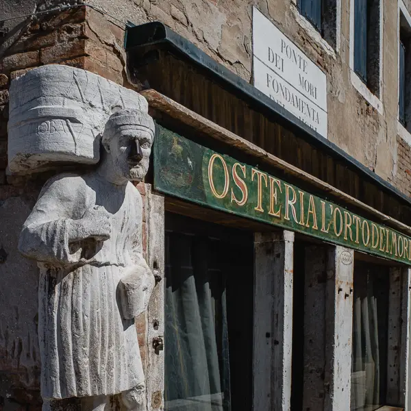 An ancient statue of a moorish trader decorates a building on the Campo dei Mori in Venice's Cannaregio district.