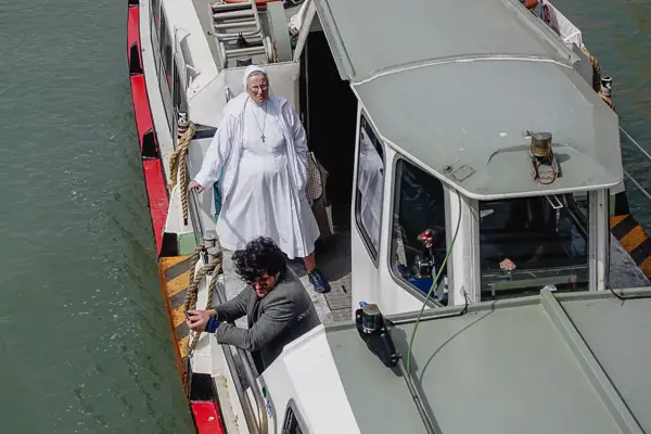 Nun on motoscafo water bus in Venice, Italy.