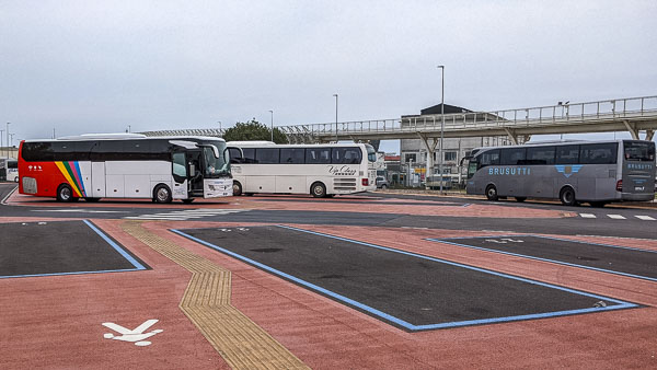 Tourist buses and Brusutti airport bus on Tronchetto parking island