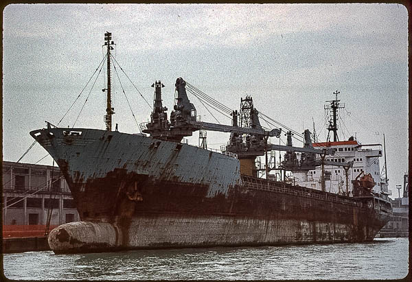 Rusty cargo ship in Venice's Marittima cruise basin, 1999
