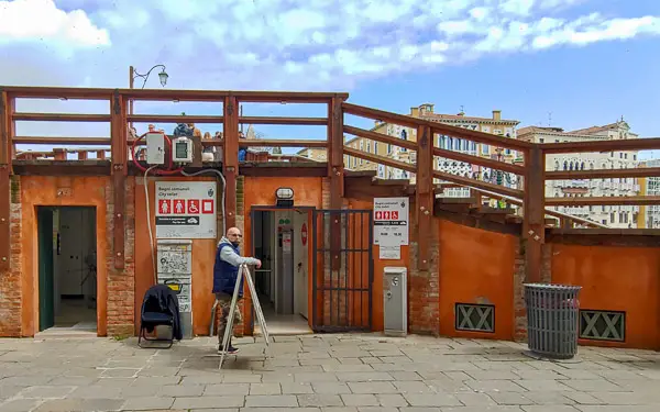 Public toilets at Accademia Bridge, Dorsoduro, Venice, Italy.