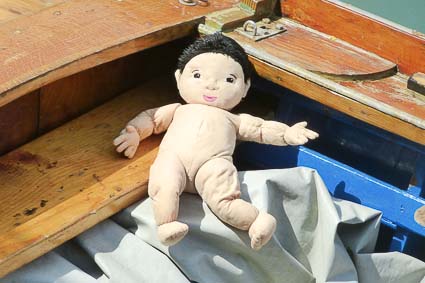 Naked doll on the Lido